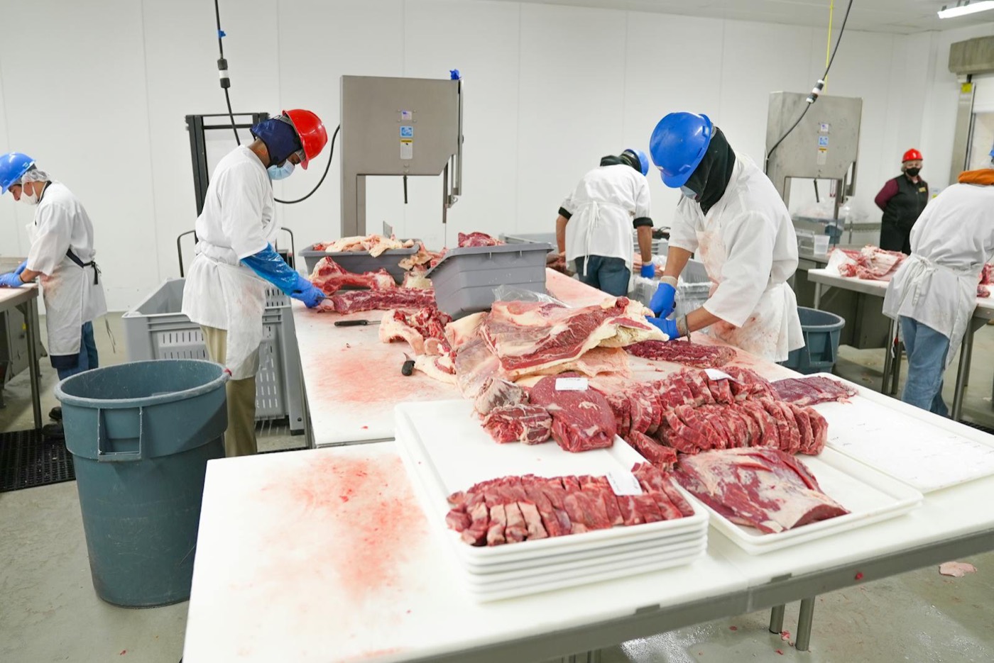 Employees inside a food processing facility